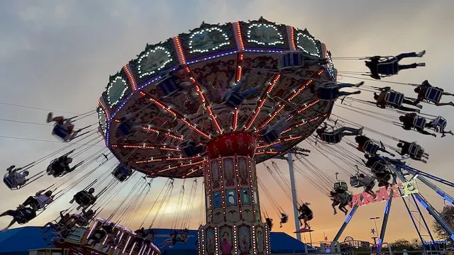 a ferris wheel with people on it